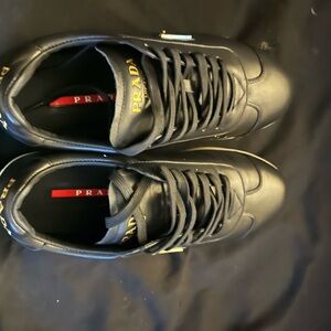 Prada Black Leather Sneakers with Red Insole Accent